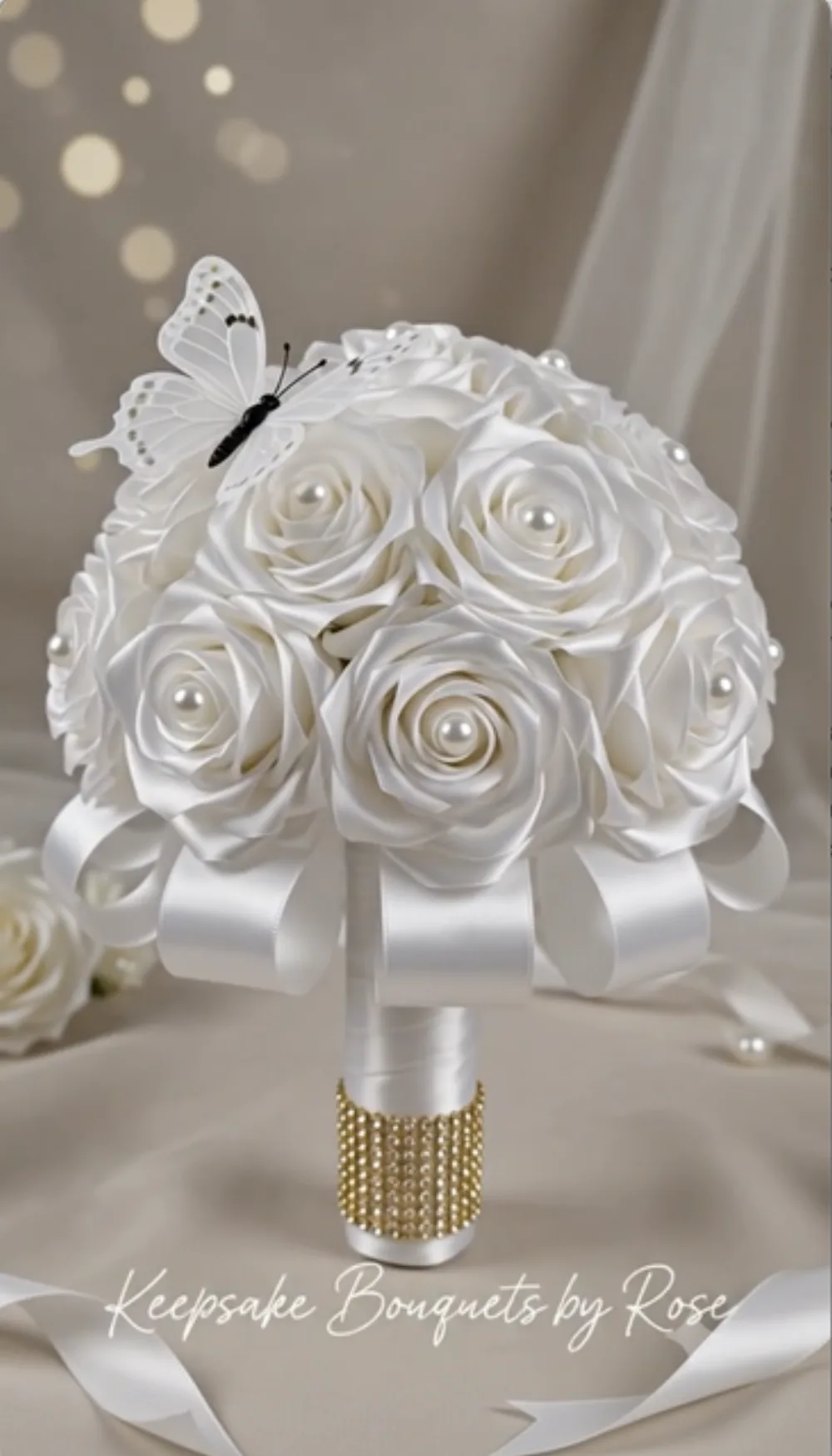 A finished white satin rose bridal bouquet by Rose Hernandez